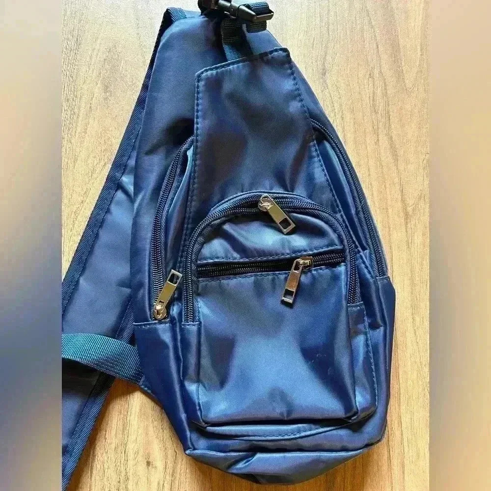 Gold Coast navy sling bag w several zip pockets, travel - Picture 2 of 8